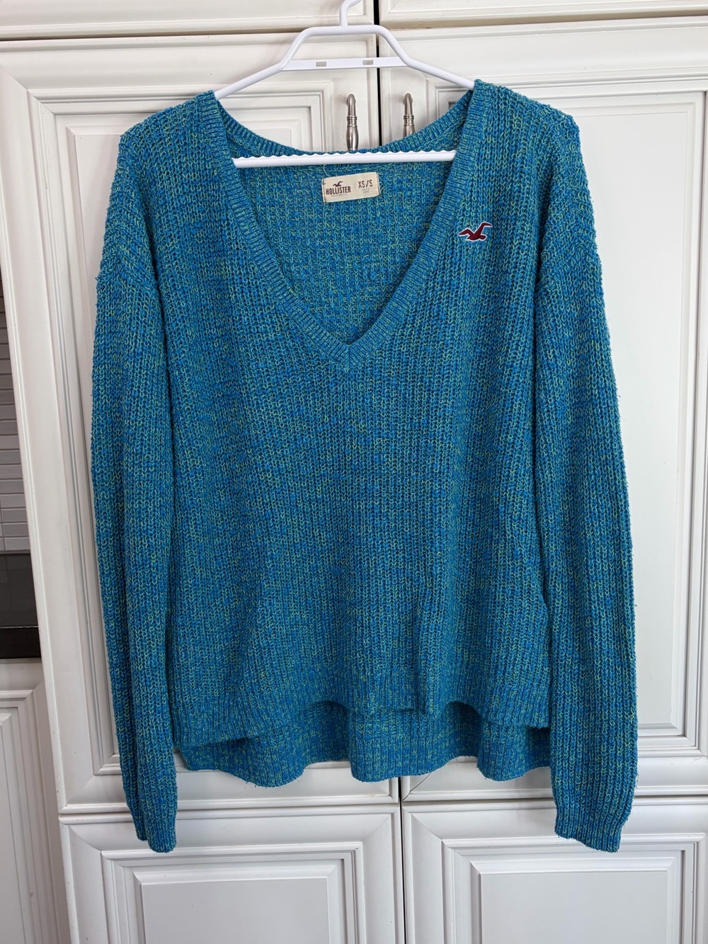Hollister woman’s deep v-neck lightweight knit sweater